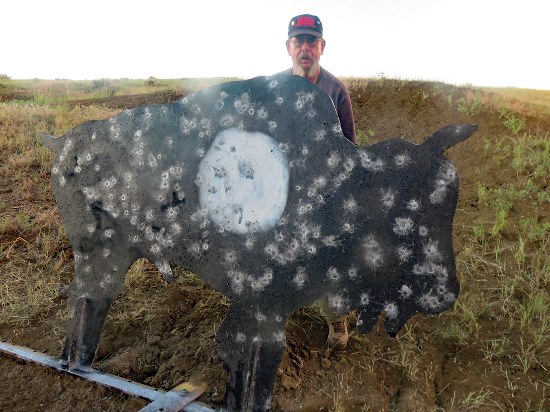 Al Kajin stands behind the 805-yard buffalo; look at all the hits!